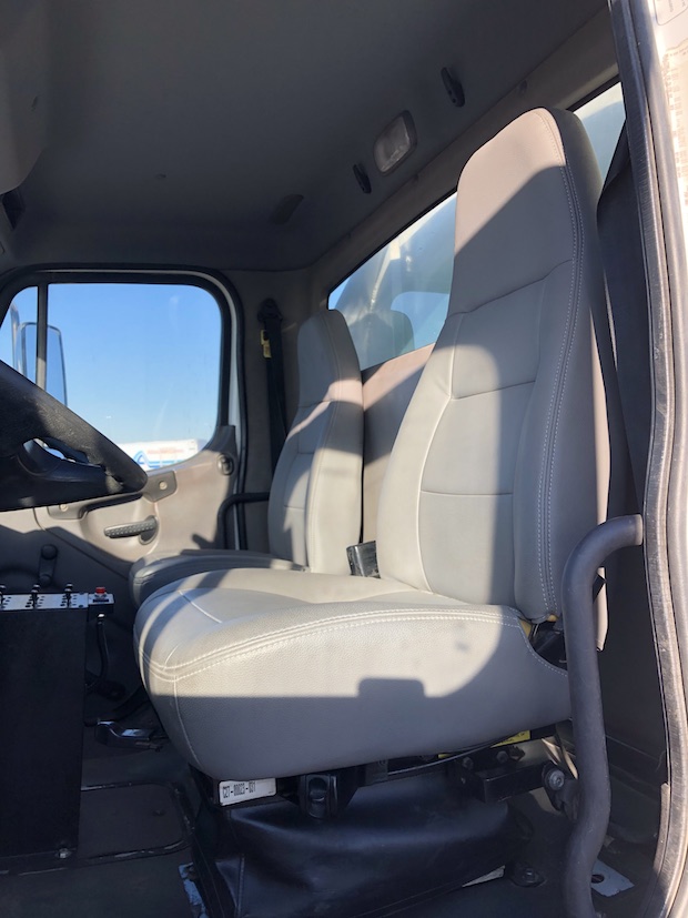 2009 Freightliner M2 106 4,250 Gallon Water Truck. Drivers seat.