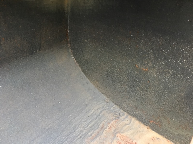 1999 Ford F800 Water Truck. Inside of Interpipe Equipment water tank.