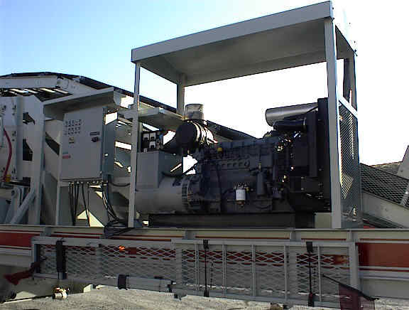 Fab Tec Pro Wash Master 5x16 Portable Wash Plant. Close up view of 150kw generator with switchgear.